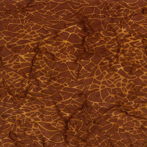 Brown batik yardage fabric with netted animal-print pattern