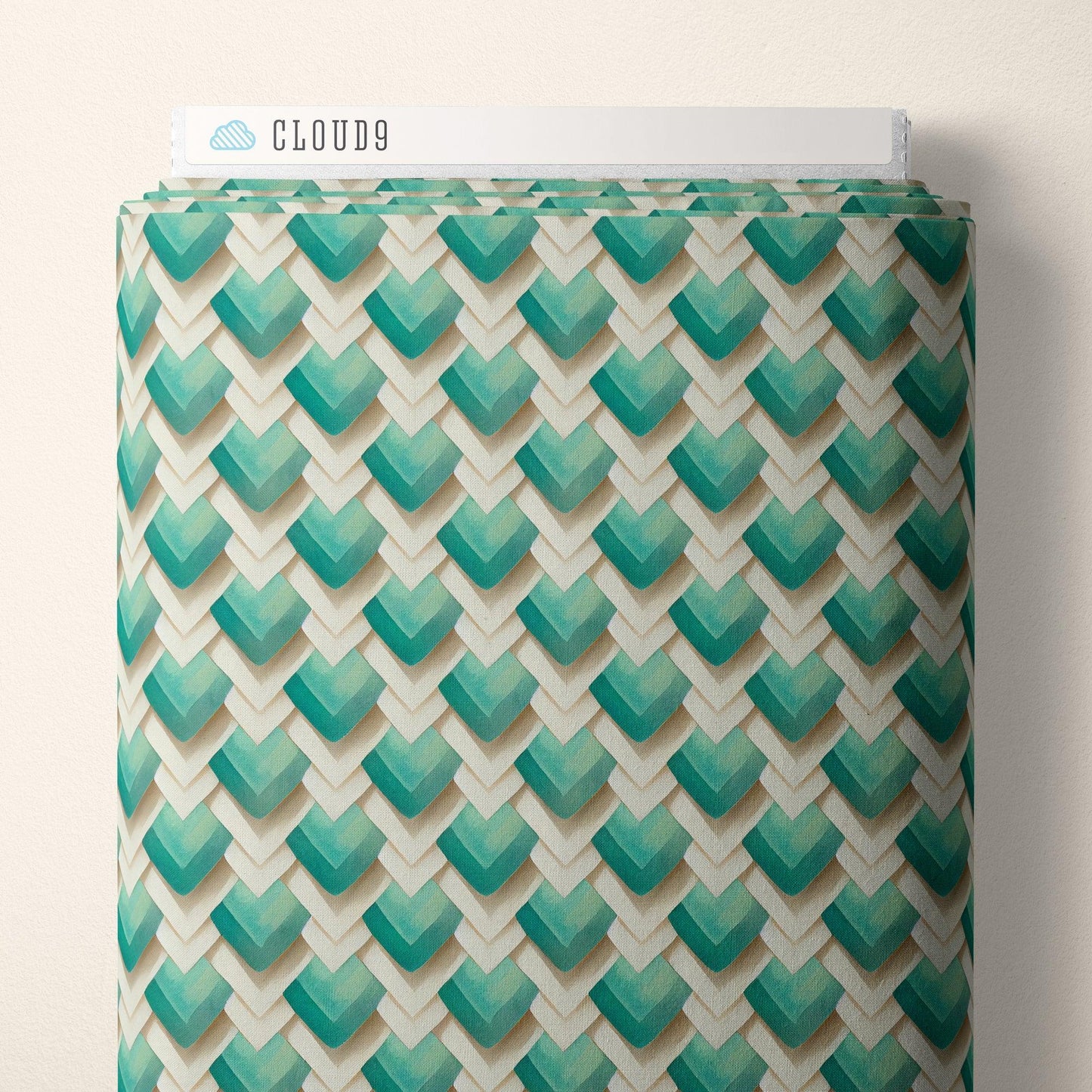 Organic cotton fabric with turquoise blue chevron diamond pattern on cream background