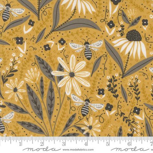 Honey yellow fabric with gray leaves, white daisies, and black-and-white bees
