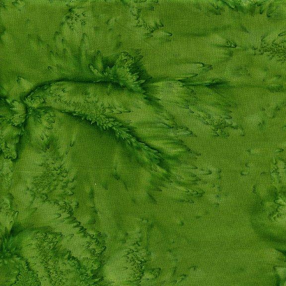 Green fabric with mottled leafy pattern and small sprig-like marks