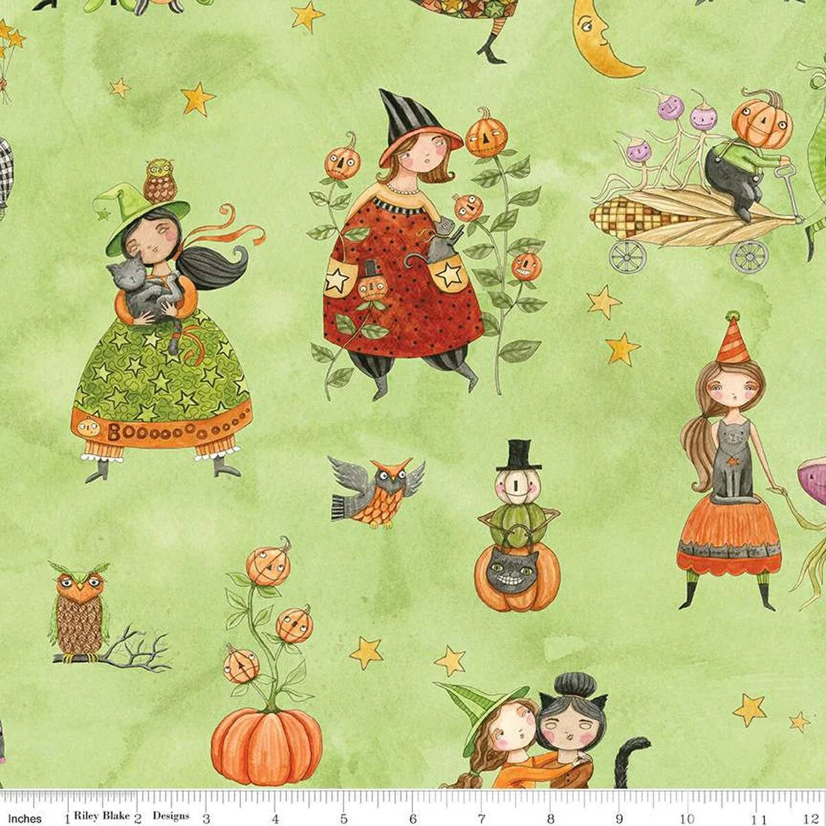 Green Halloween character fabric with cartoon witches, cats, owls, pumpkins, and stars pattern