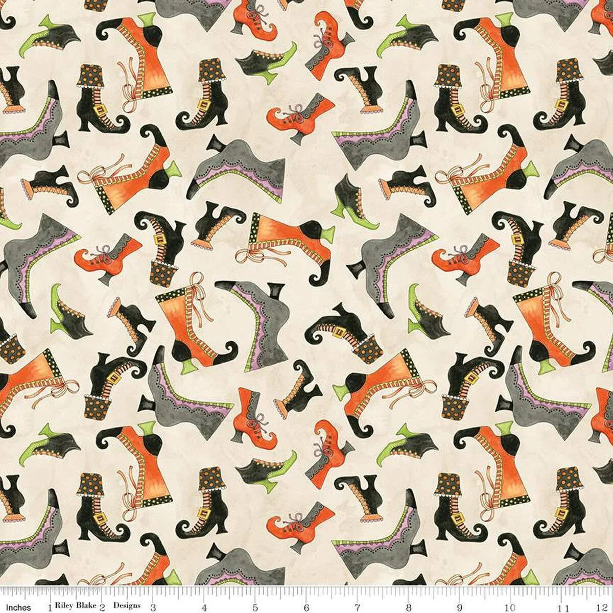 Halloween cat pattern fabric with cream background and orange, green, and black silhouettes