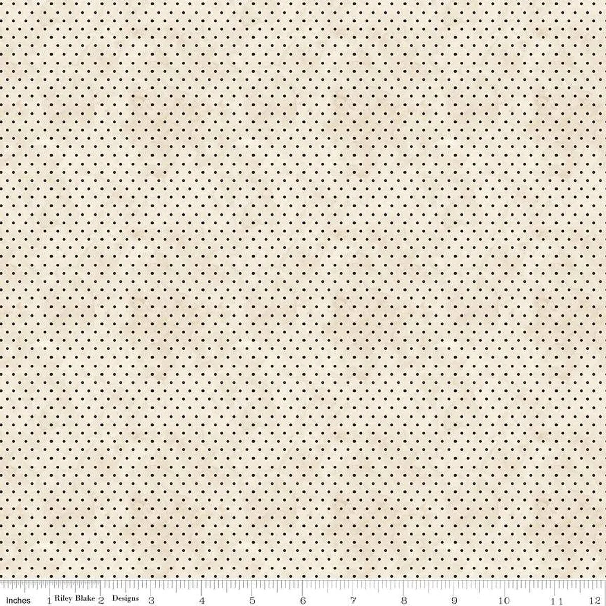 Cream cotton fabric with small dark dot pattern