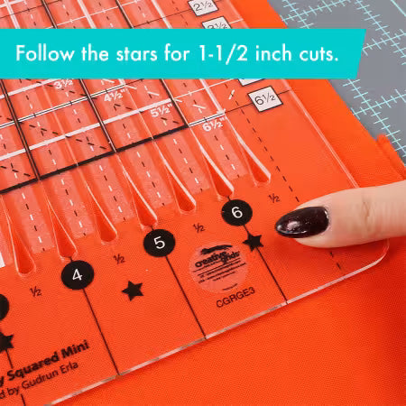 Stripology Mini quilting ruler with star guides and cut lines