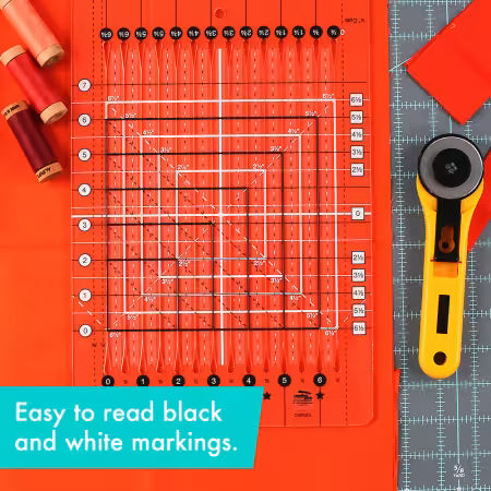 Stripology Mini quilting ruler with grid, star icons, and inch markings