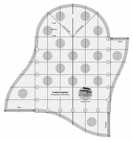 Scallop quilt template with grid lines, size markings, and scalloped edge