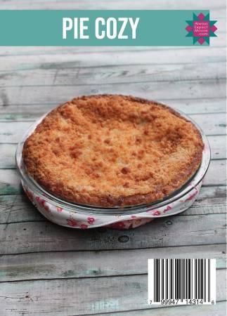 Round baked pie in a clear glass dish with a light golden crust