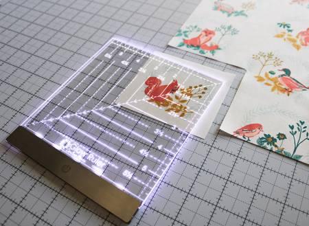 6in square acrylic ruler with centimeter grid and diagonal guide lines, Glow Ruler text