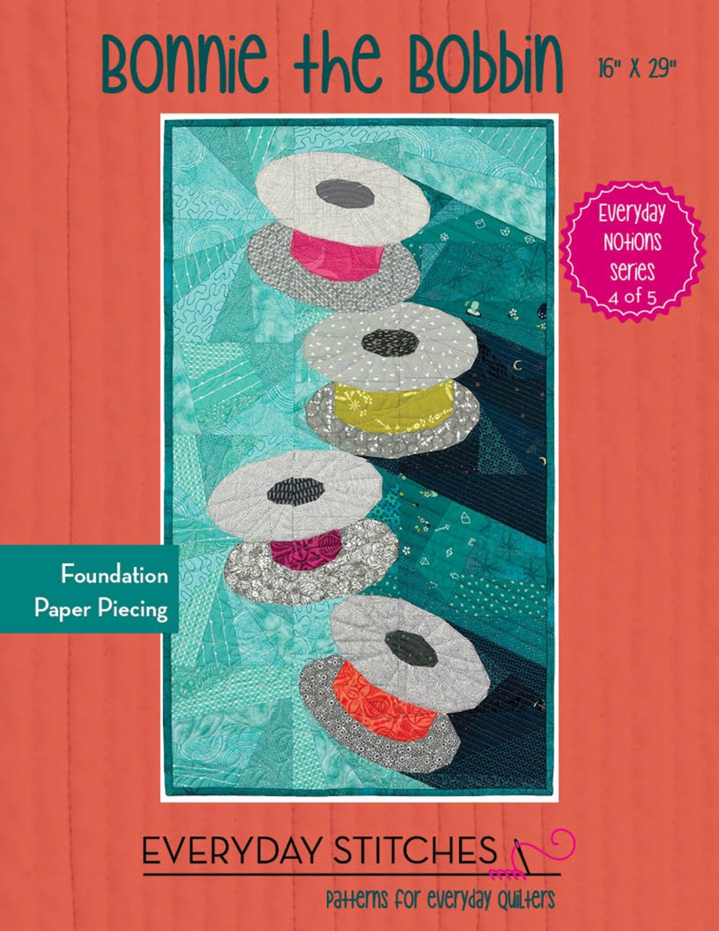 Quilt pattern cover with teal pieced blocks and stacked bobbin-style shapes, multicolor accents