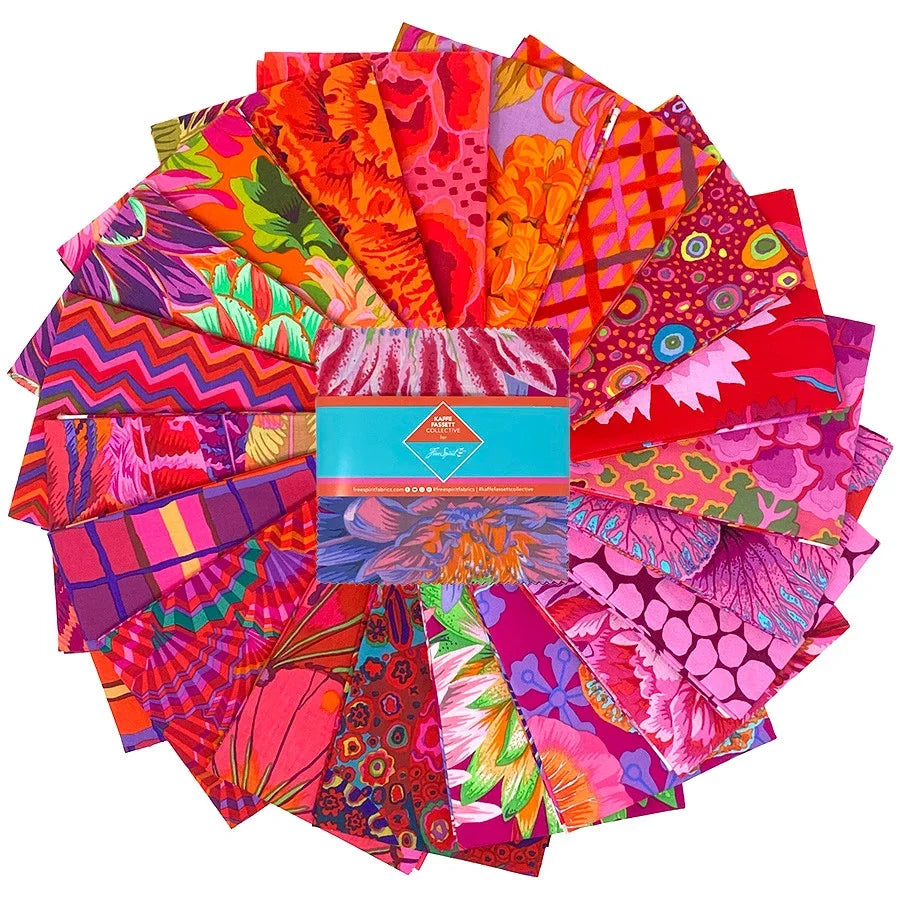 Charm pack of patterned fabric squares in red, pink, purple, and green