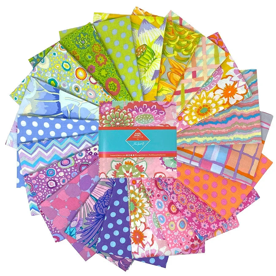 Colorful patchwork fabric charm squares, assorted green blue pink orange patterns