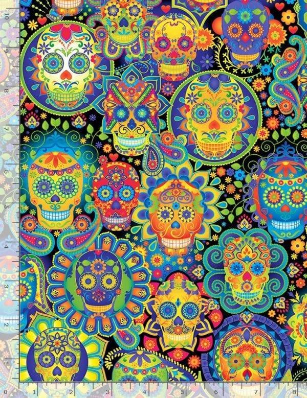 Colorful sugar skull fabric with teal and multicolor floral details, packed skull pattern.