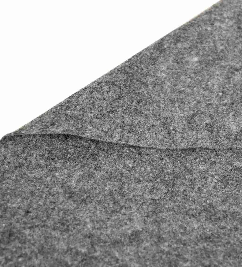 Gray felt sheet with dense textured surface, close-up