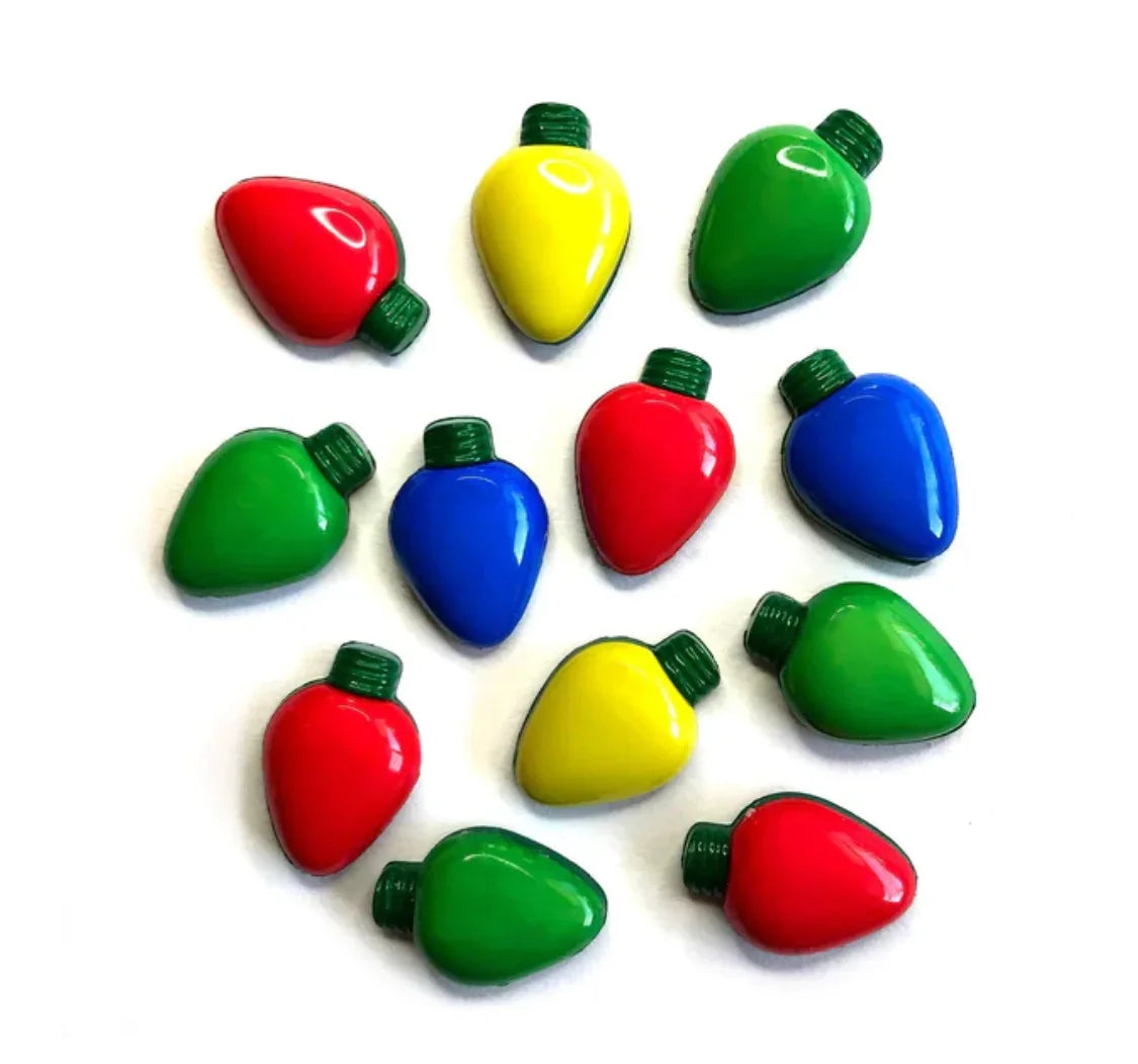 Colorful Christmas light bulb buttons, red green blue and yellow with green caps