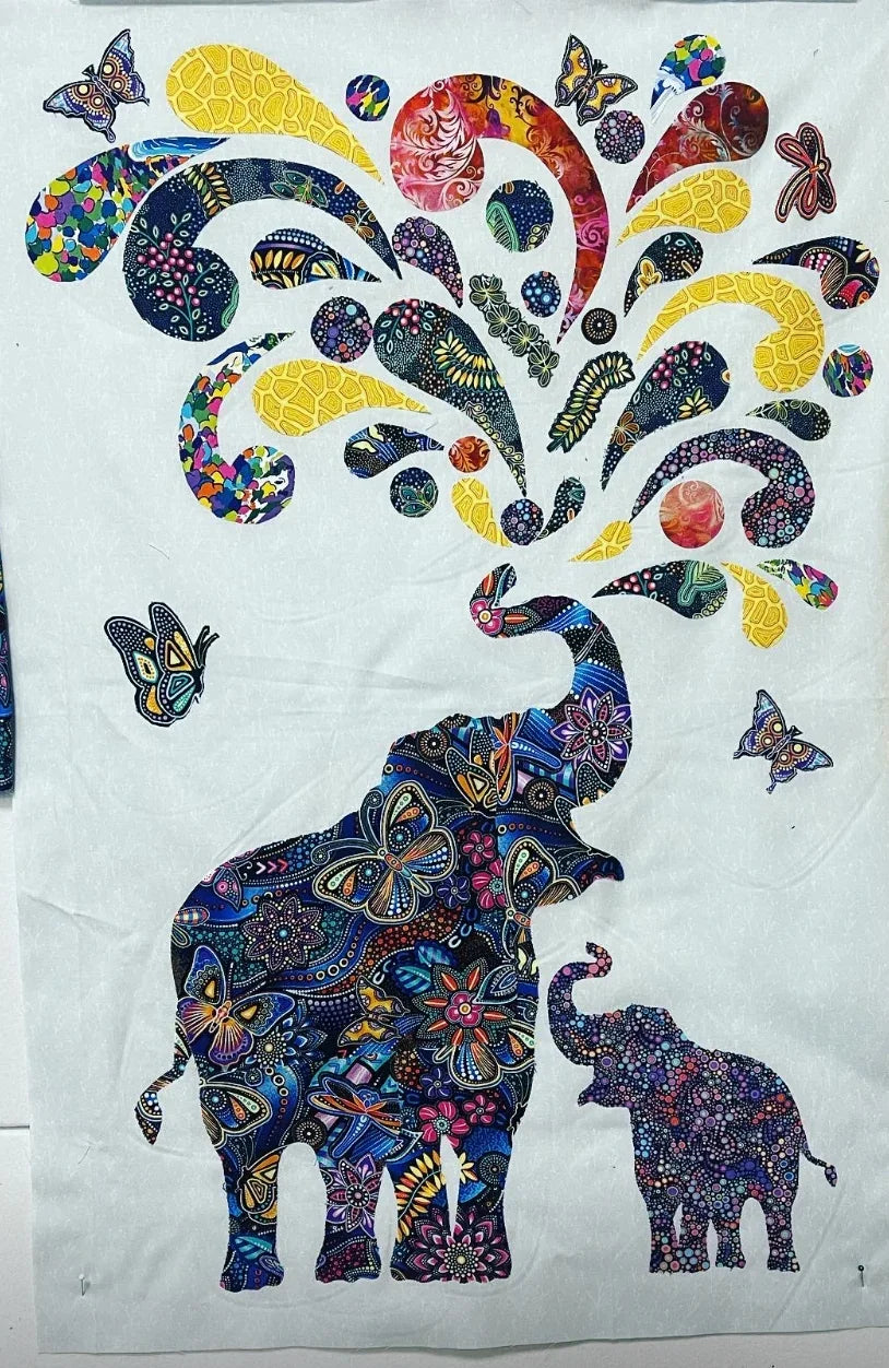 Paisley collage fabric panel with elephant, butterflies, and multicolor paisley motifs