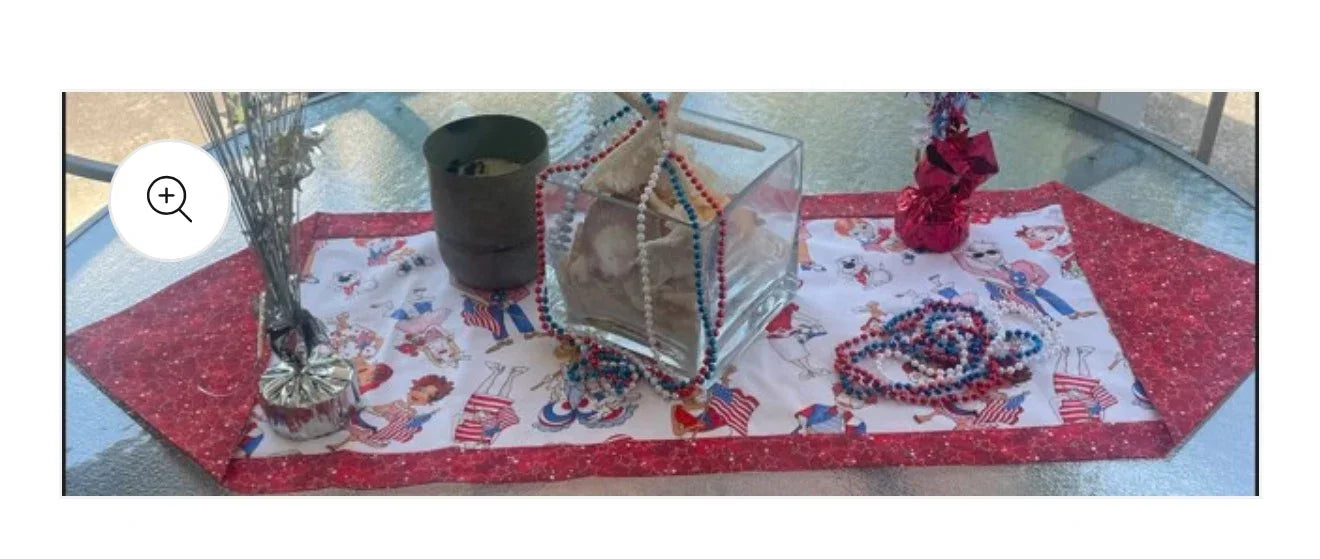 Festive table runner with red and white pattern, stitched borders for dining table