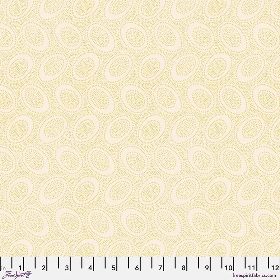Ivory fabric with repeating dot-and-ring pattern, small scale