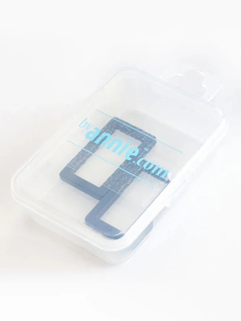 Set of two rectangle rings, black metal, in clear storage case