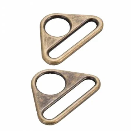 Antique brass triangle flat rings, two-piece set, open oval centers.