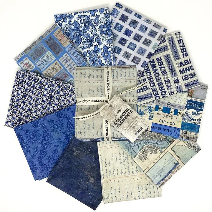 Indigo fat quarter fabric bundle with mixed blue geometric and floral prints
