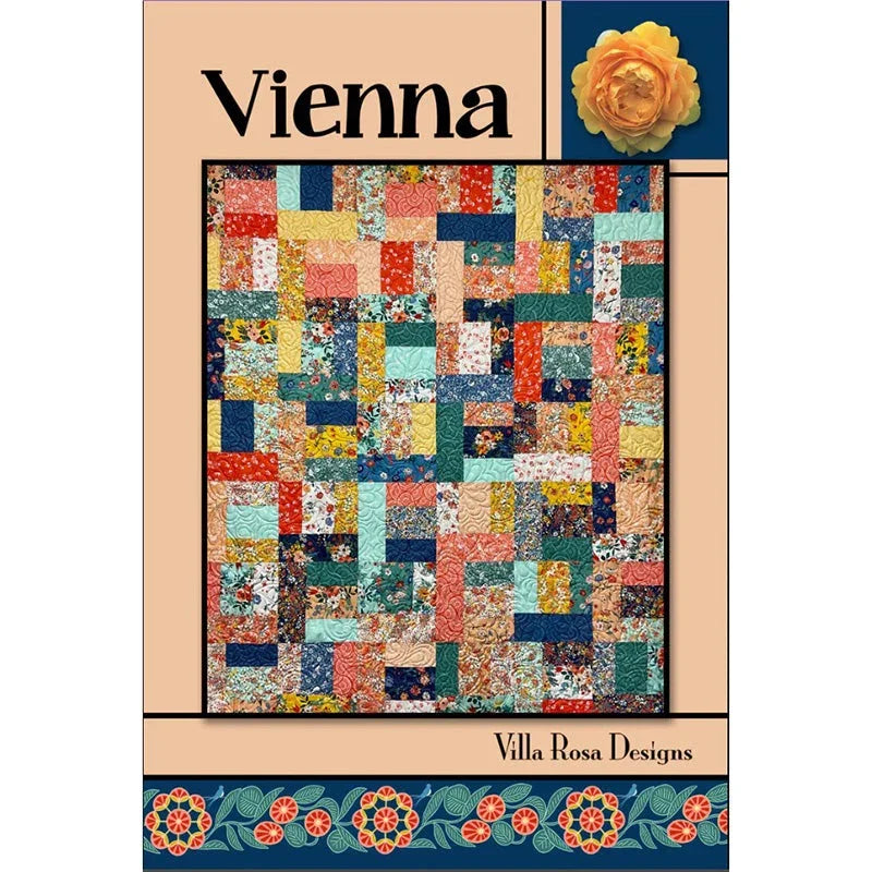 Quilt pattern booklet cover with colorful square patchwork layout