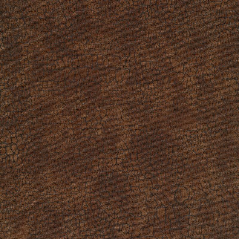 Quilting cotton fabric with crackle pattern in dark brown and earth tones