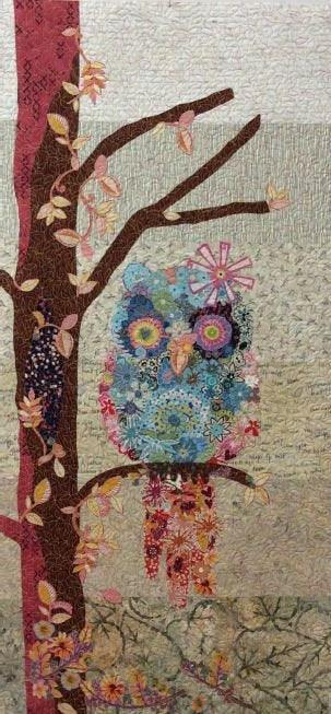 Multicolor owl collage quilt pattern with branch and floral motifs on light fabric