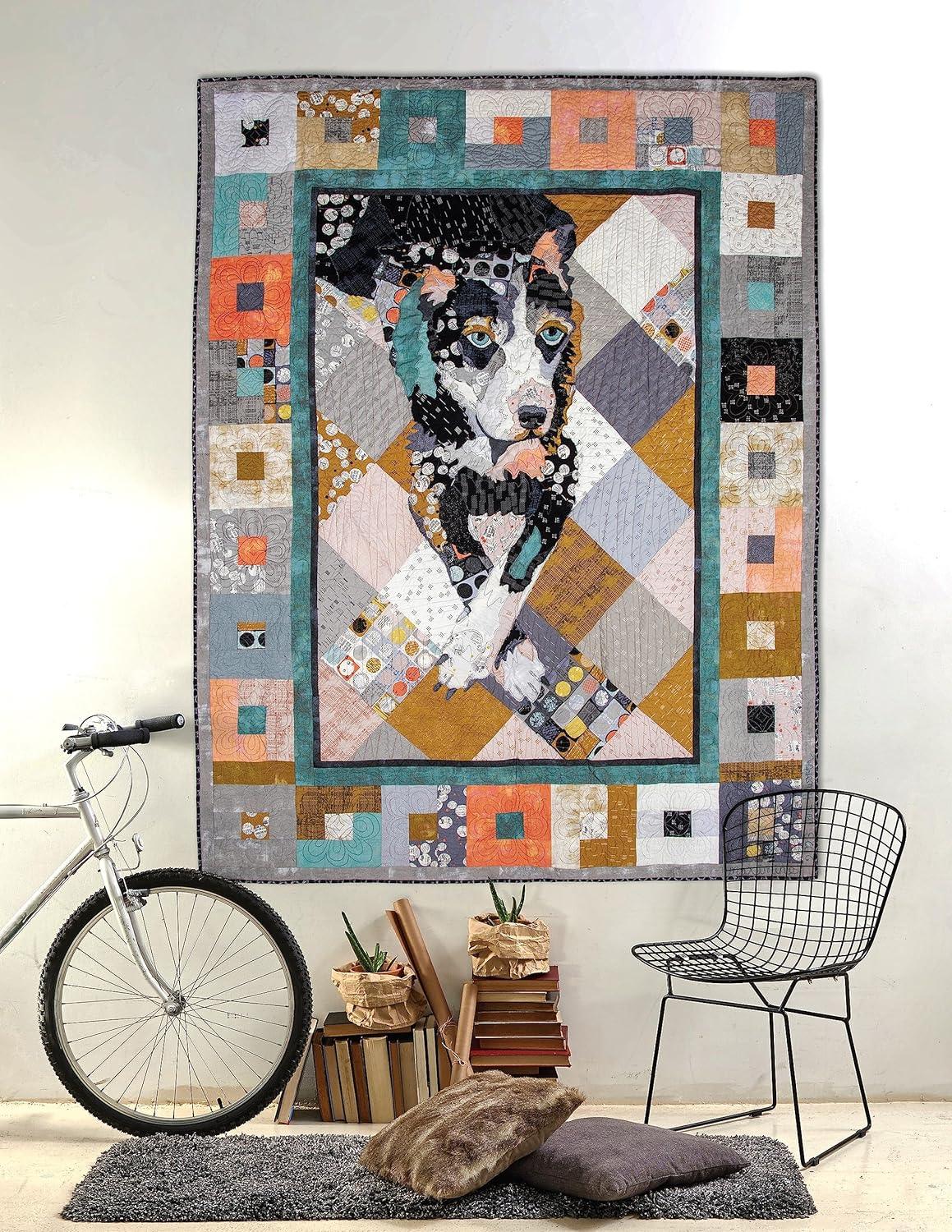 Wall-hung collage quilt artwork with a dog centerpiece and multicolor border