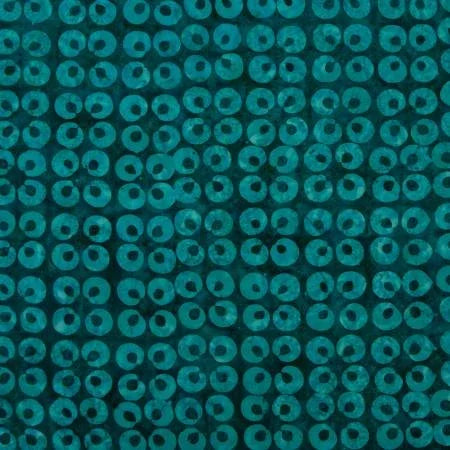Teal batik denim fabric with repeating circular ring pattern
