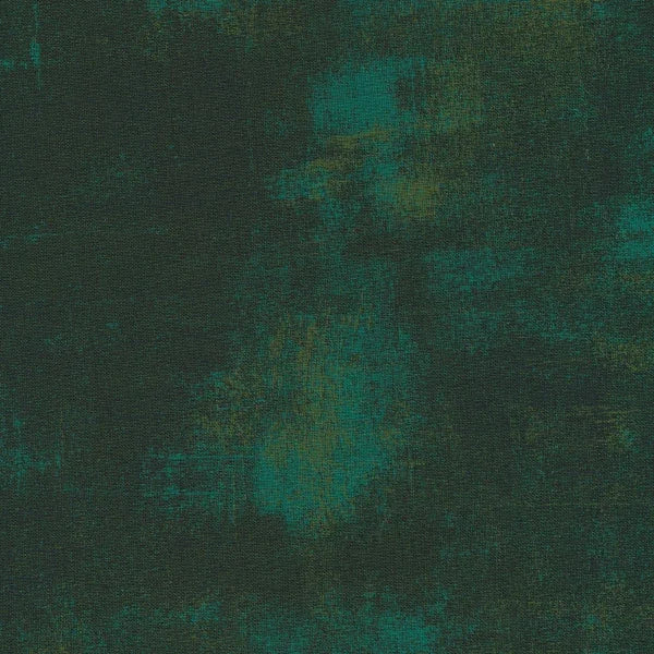 Cotton quilting fabric in dark green with teal abstract marbled print