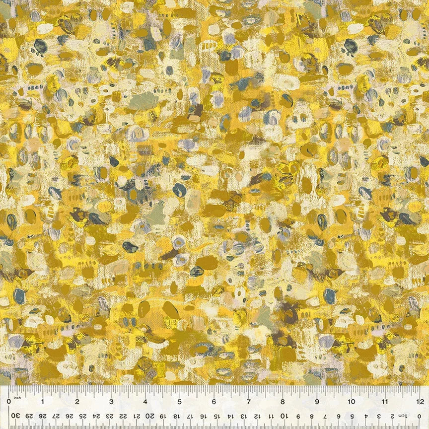 Yellow abstract printed fabric with small blue, green, and white motifs, quilting cotton