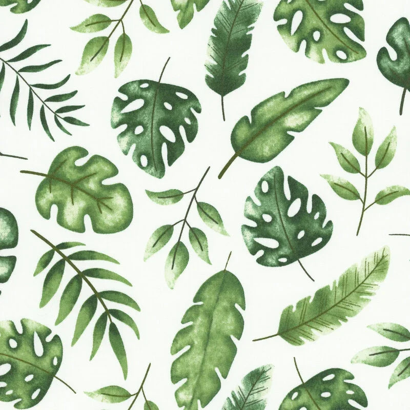 Tropical leaf print fabric with green fronds on white background