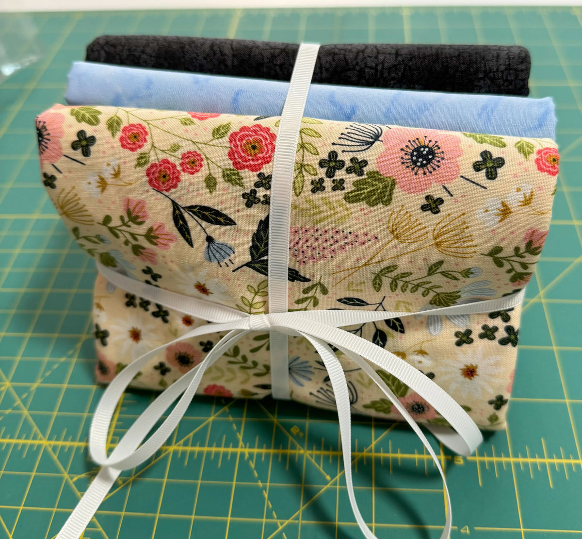 Cotton quilt bundle: cream floral birds with black and light blue fabric pieces