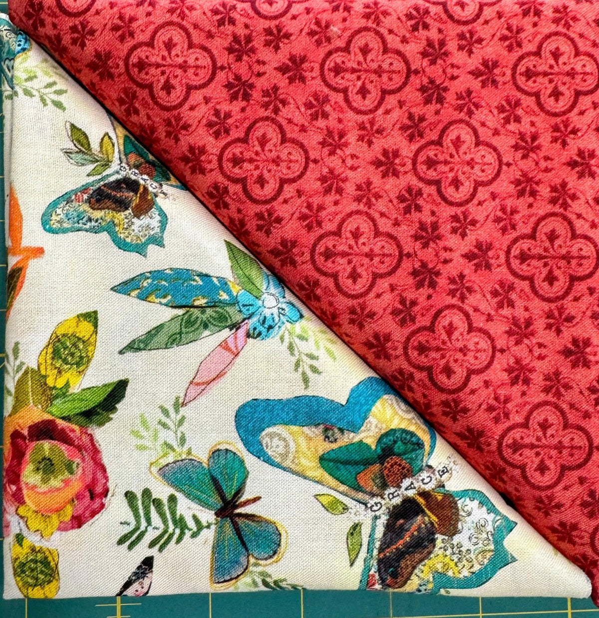 Table runner kit fabric: cream with birds and butterflies, red reverse with ornamental print