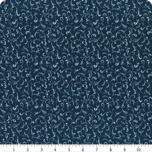 Navy fabric swatch with white scrollwork pattern