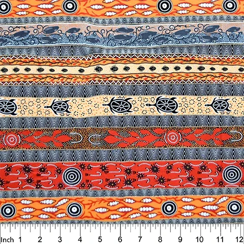 Geometric striped fabric in orange and navy with red circular patterns