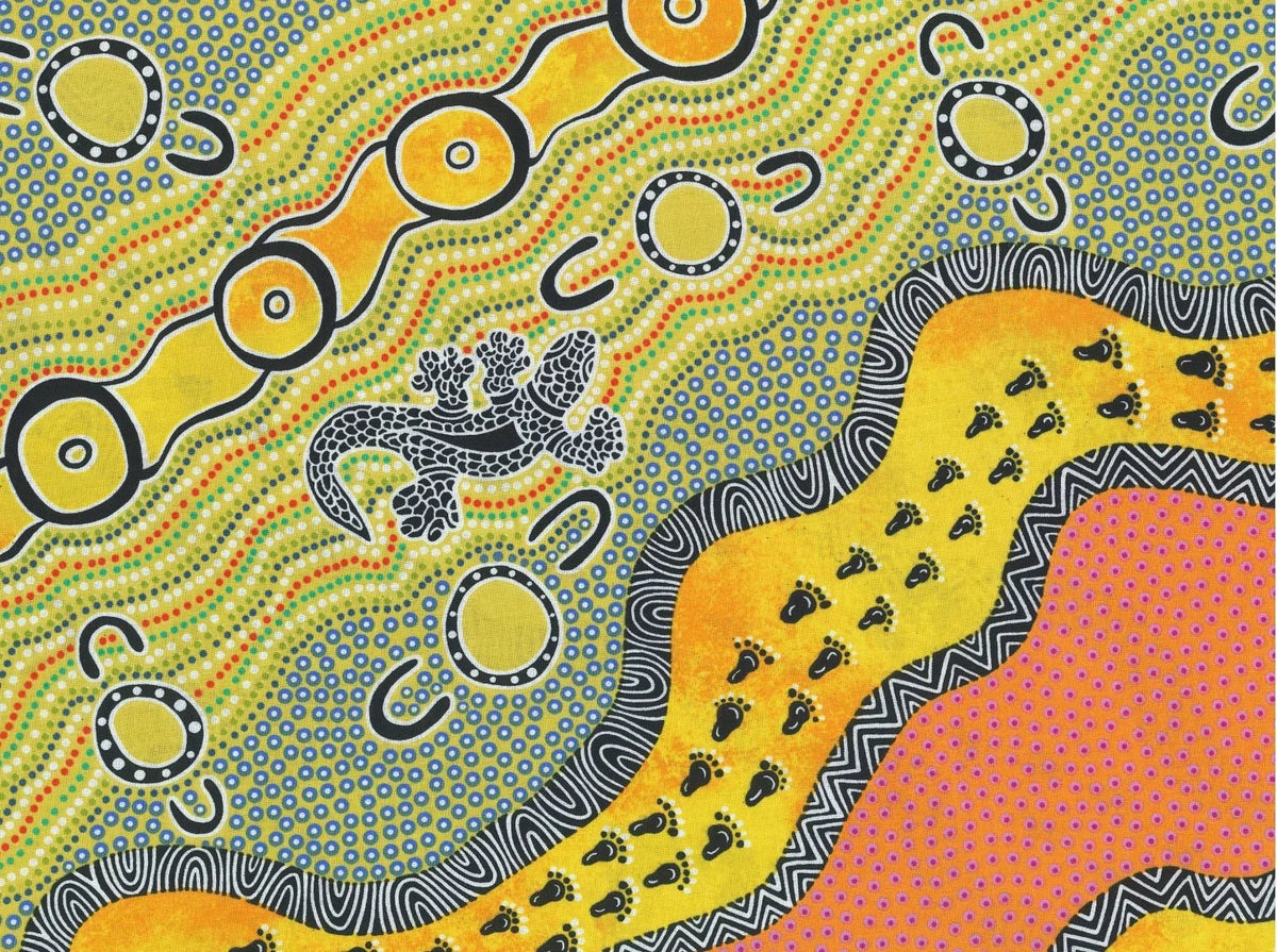 Multicolor patterned fabric with yellow trim, pink section, and hunting symbols