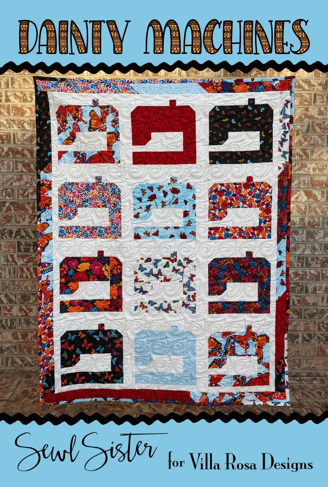 Dainty Machines quilt pattern, multicolor patchwork blocks with red and dark borders