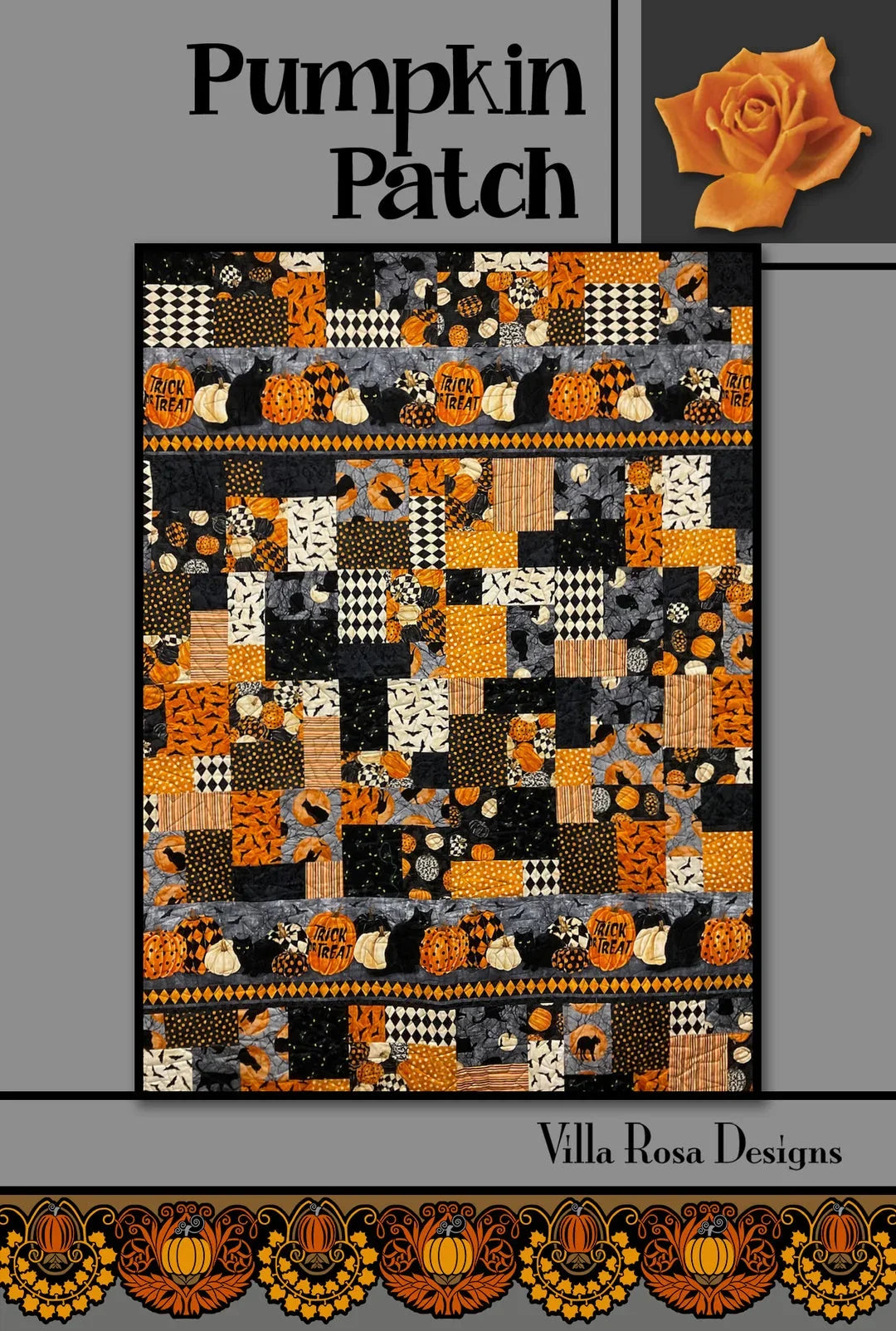 Pumpkin Patch patchwork quilt with orange, black, and white squares