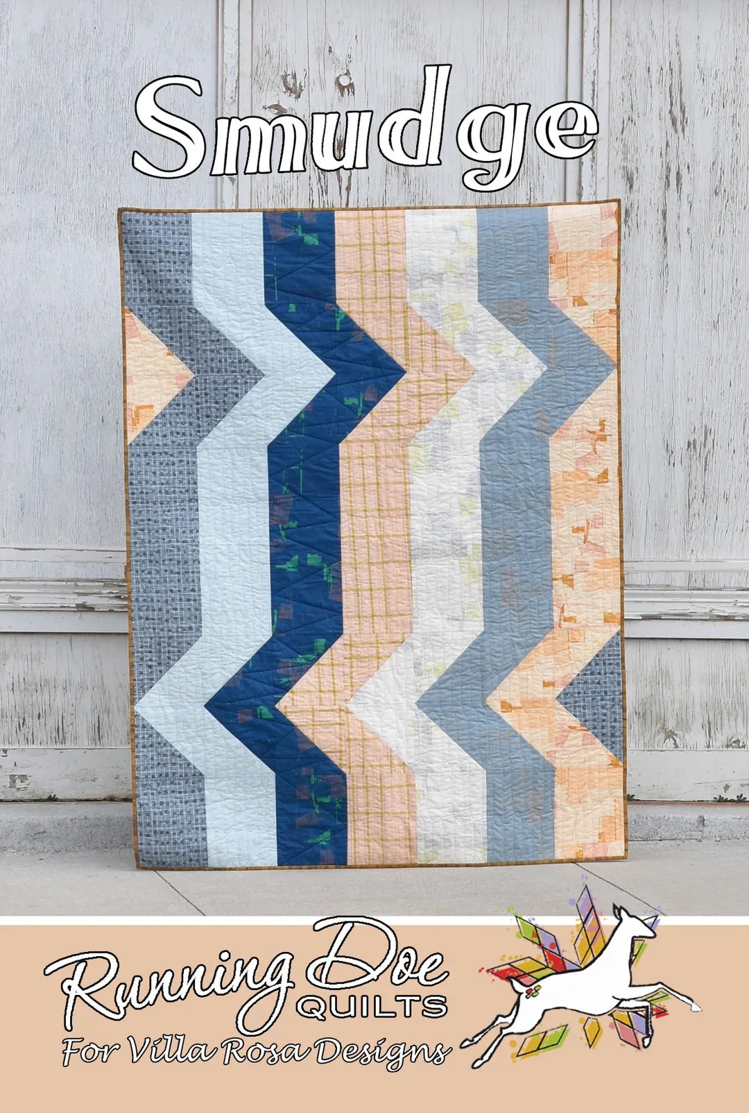 Chevron smudge quilt with blue, teal, gold and coral blocks