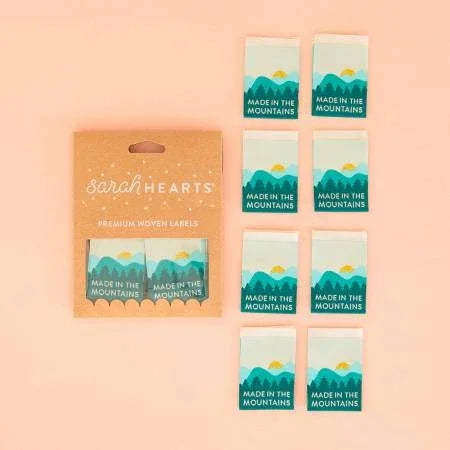 Made in the Mountains labels with mountain logo and Sarah Hearts branding