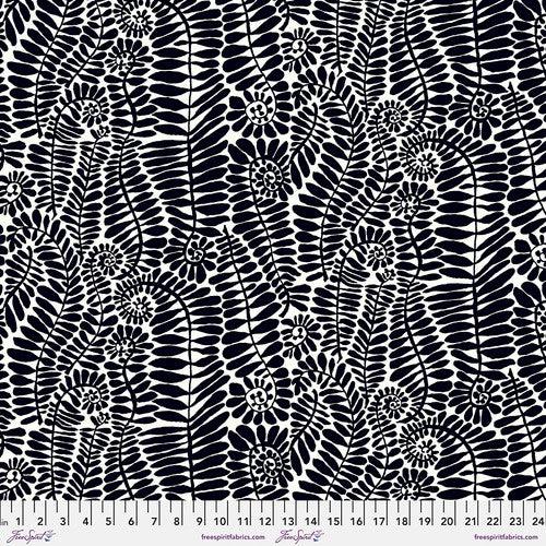 Botanical print fabric with black fronds and white circular motifs