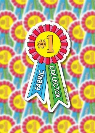 Award sticker with yellow #1 rosette and white blue ribbons reading FABRIC COLLECTOR