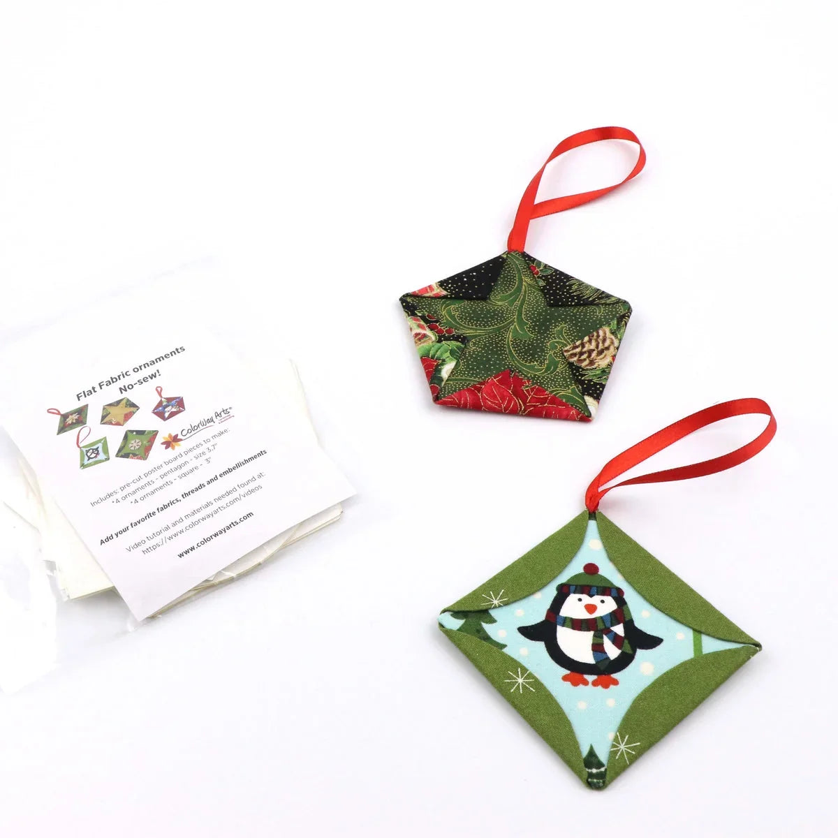 Fabric ornament DIY kit: two flat cloth ornaments with red hanging ribbons and instructions