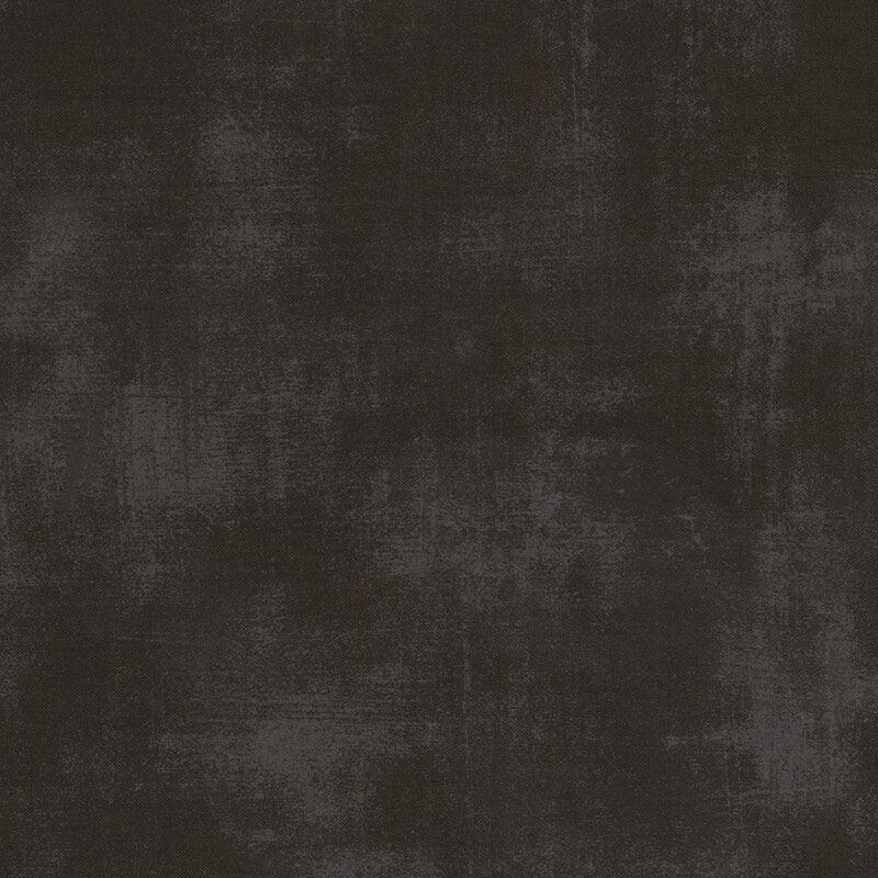 Dark charcoal grunge-textured fabric with subtle mottled pattern