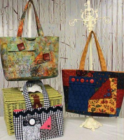Quilted mini tote bag with patchwork panels, top handle, and magnetic tab closure