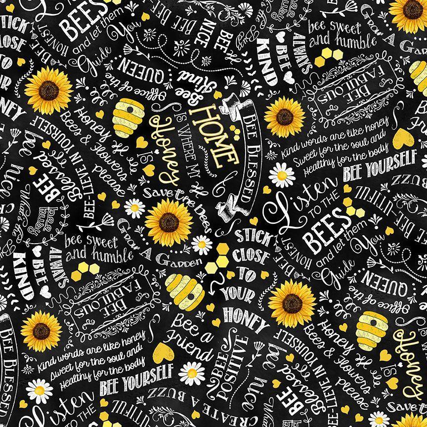 Black cotton fabric with yellow bees and white cursive motivational quotes