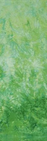 Green ombre jungle batik fabric with leaf-like patterns