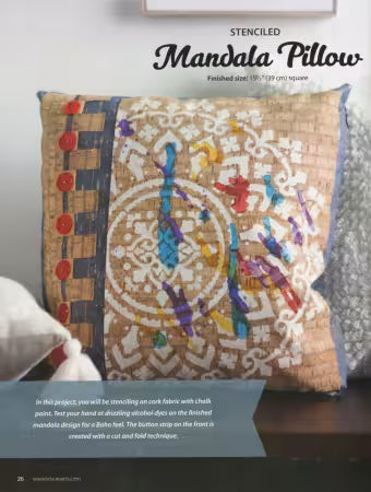 Stenciled mandala pillow square on cork fabric with colorful floral and geometric details