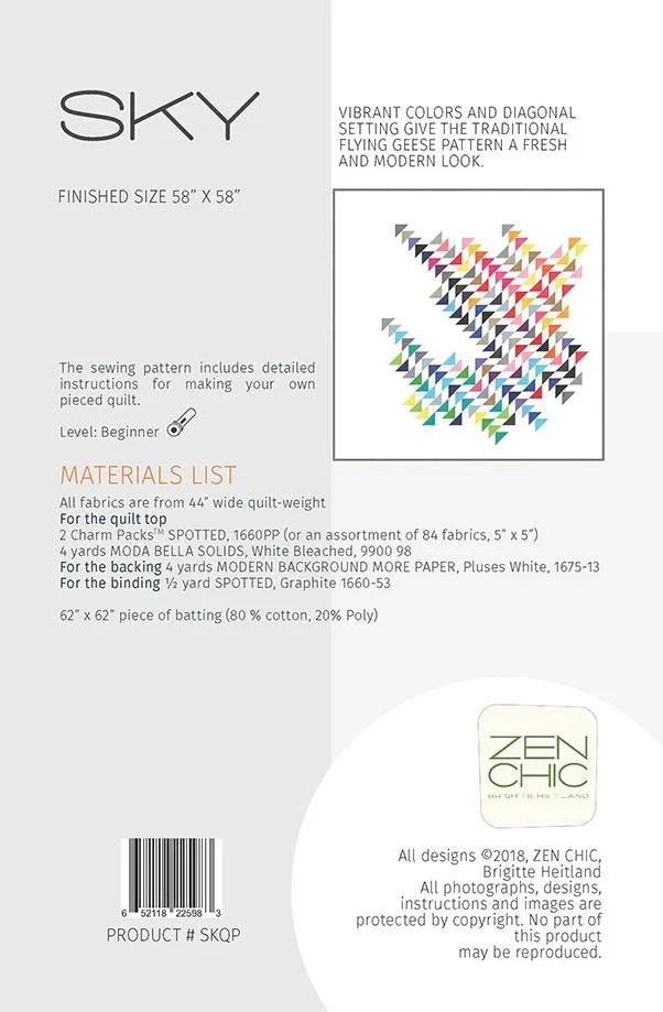 Quilt fabric pattern swatch with multicolor diagonal zigzag triangles on white background